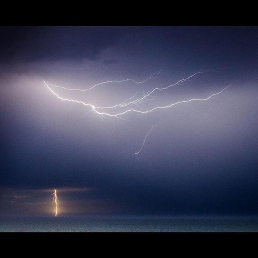 Beach Photograph - Lightning Over The Atlantic Ocean by Alex Snay