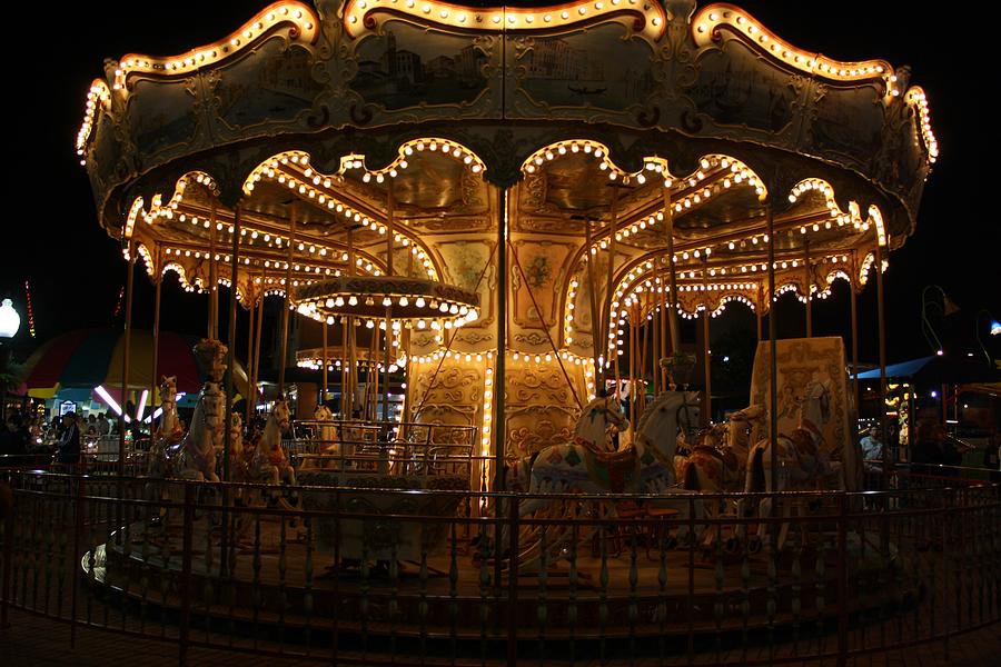 Lights Of A Merry-go-round Photograph By Maria Young - Fine Art America