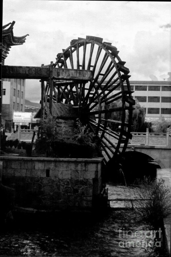 Lijang Wheel Photograph by FineArtRoyal Joshua Mimbs
