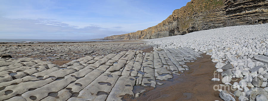 Limestone rocky beach panorama Photograph by Warren Photographic