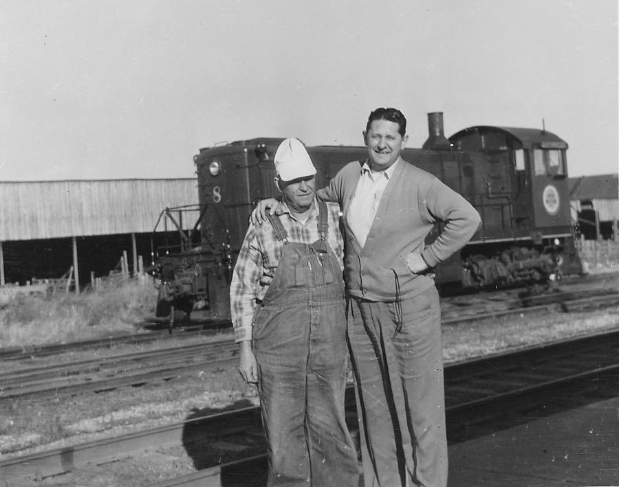 Lineman and Agent in Front of Locomotive  Photograph by Chicago and North Western Historical Society
