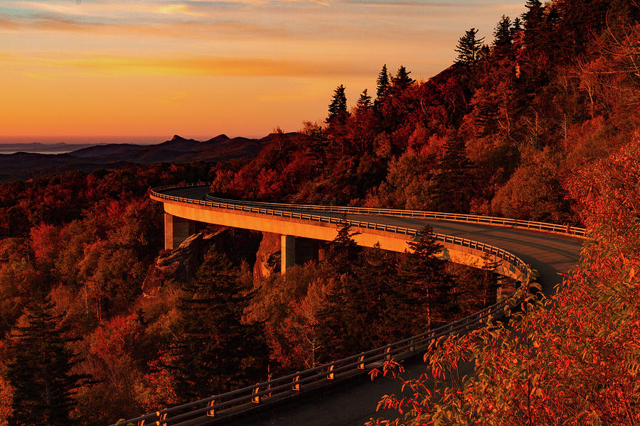 Linn Cove Viaduct at Sunrise Photograph by Kelly Kennon