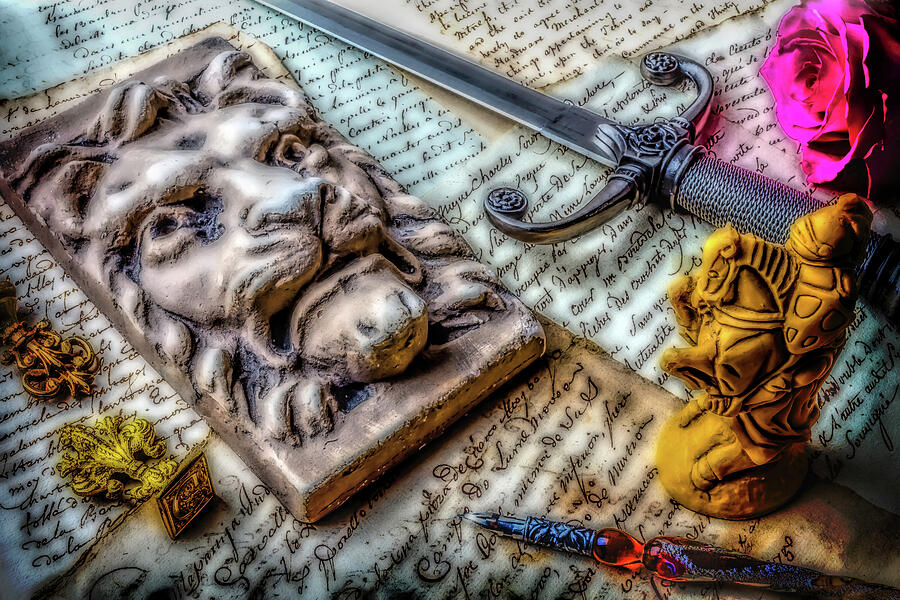 Lion And Dagger Photograph by Garry Gay