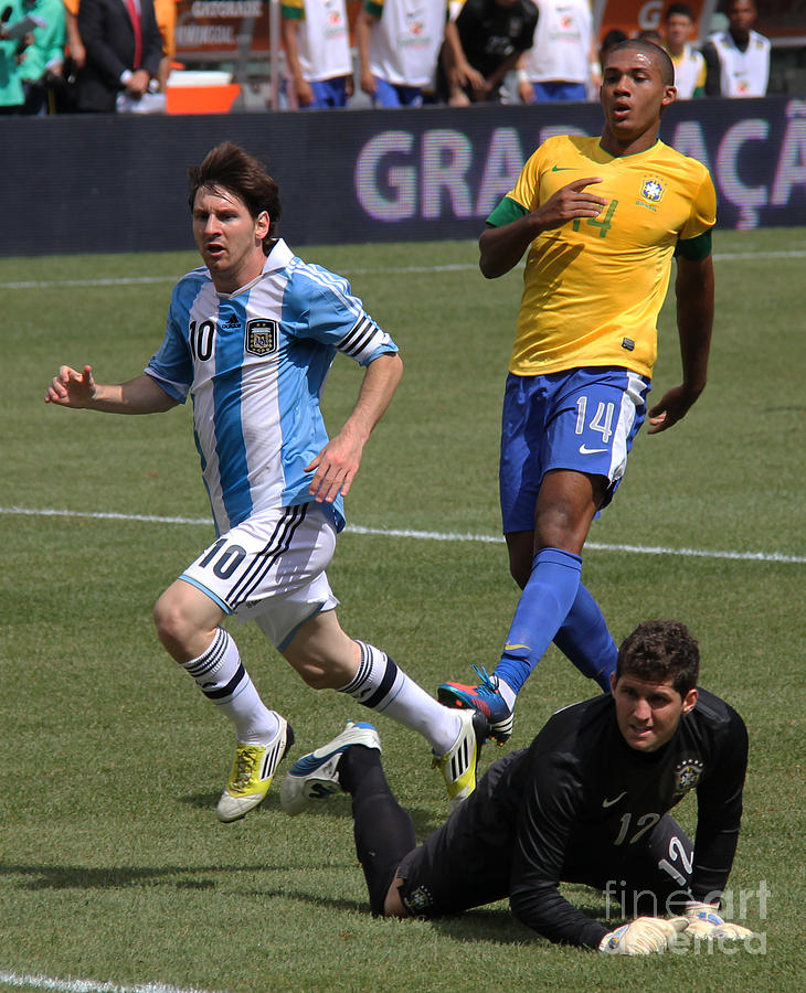 Lionel Messi Beats Rafael Cabral Photograph by Lee Dos Santos