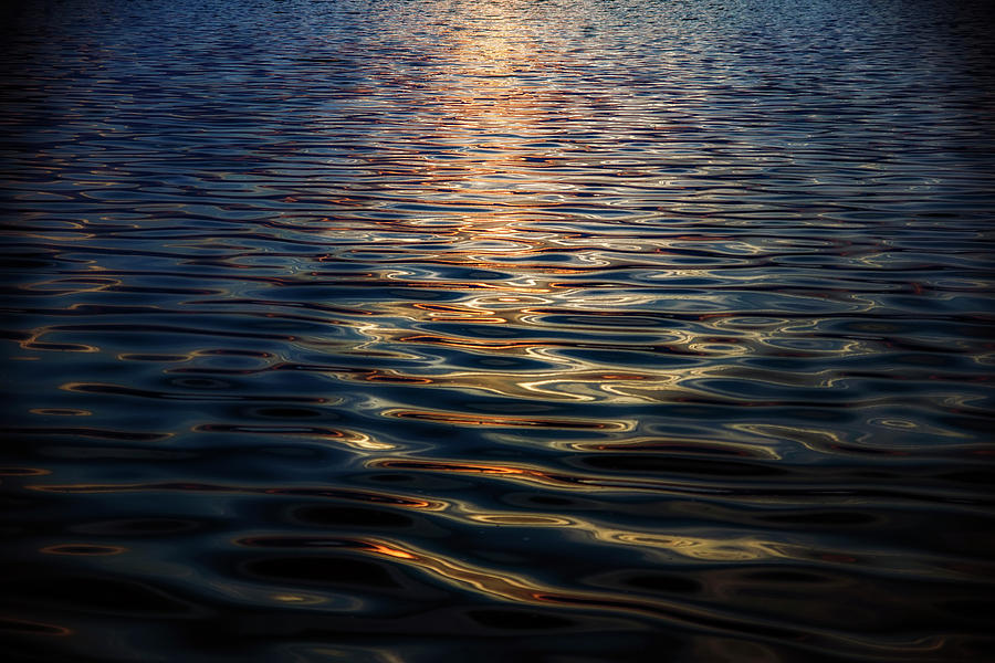Liquid reflections Photograph by Plamen Petkov