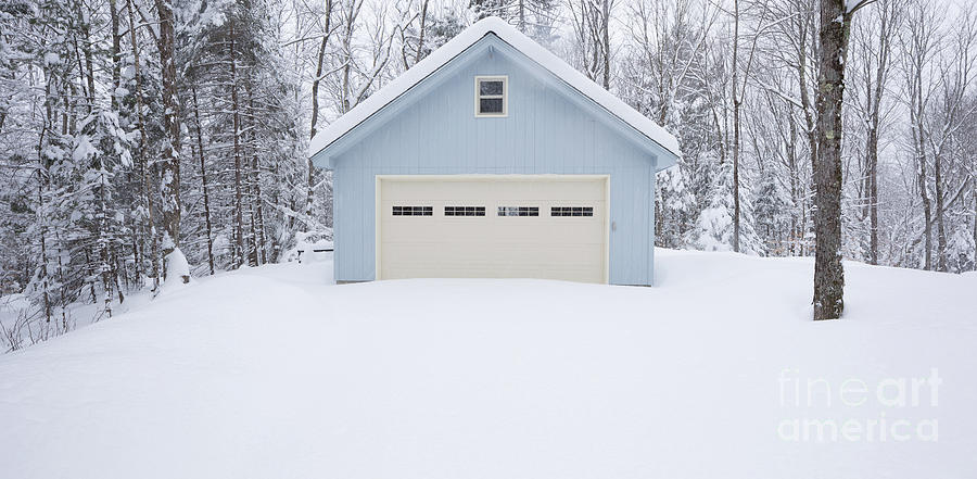 Little Blue Garage in a snow storm Photograph by Edward Fielding