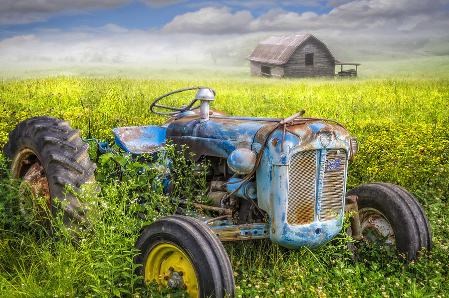 Barn Photograph - Little Blue Tractor II by Debra and Dave Vanderlaan