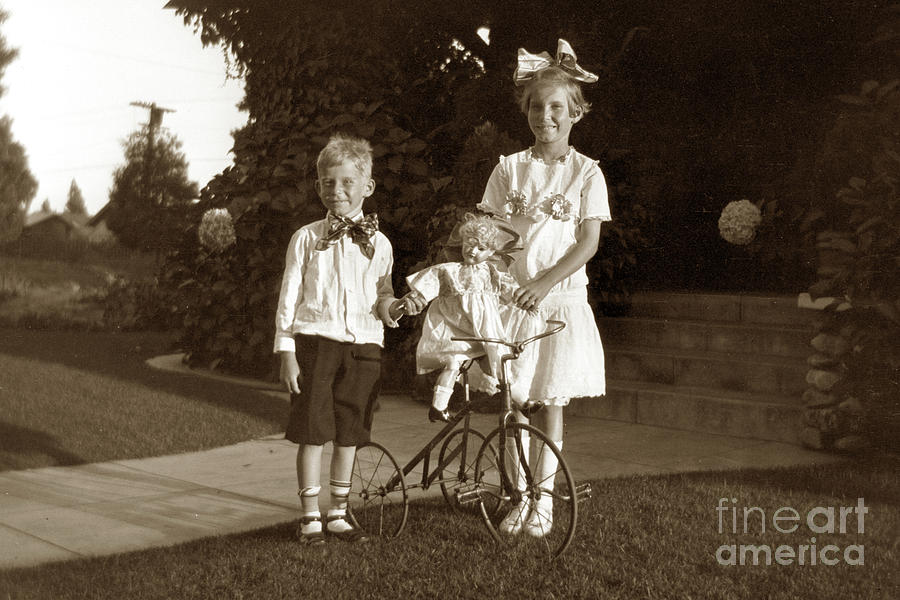 Little Boy and Girl next to  tricycle Circa 1910 Photograph by Monterey County Historical Society