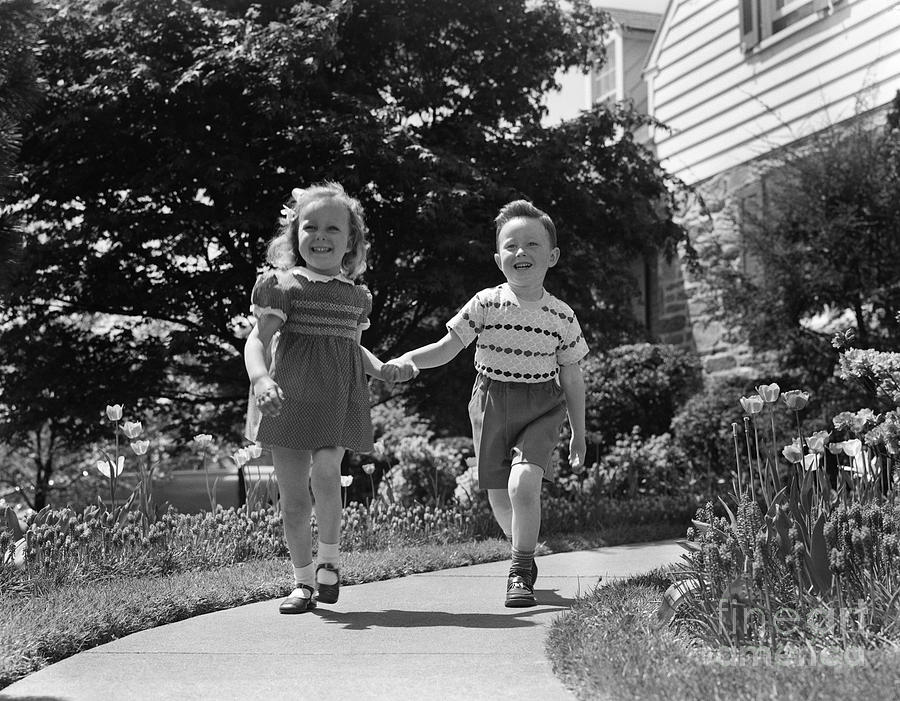 Little Boy And Girl Walking, Holding Photograph by H. Armstrong Roberts/ClassicStock