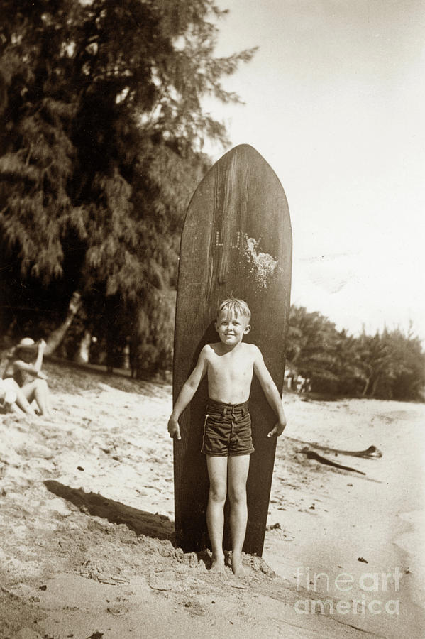 Little Boy Photograph - Little boy with Wooden Surfboard Circa 1960 by Monterey County Historical Society