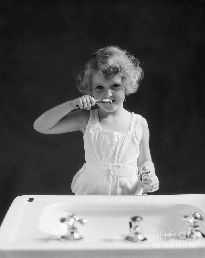 Little Girl Brushing Her Teeth, C.1930s Photograph by H Armstrong Roberts and ClassicStock