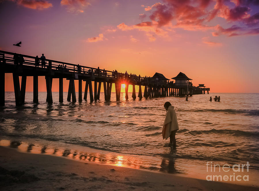 Little girl on the beach at sunset Photograph by Claudia M Photography