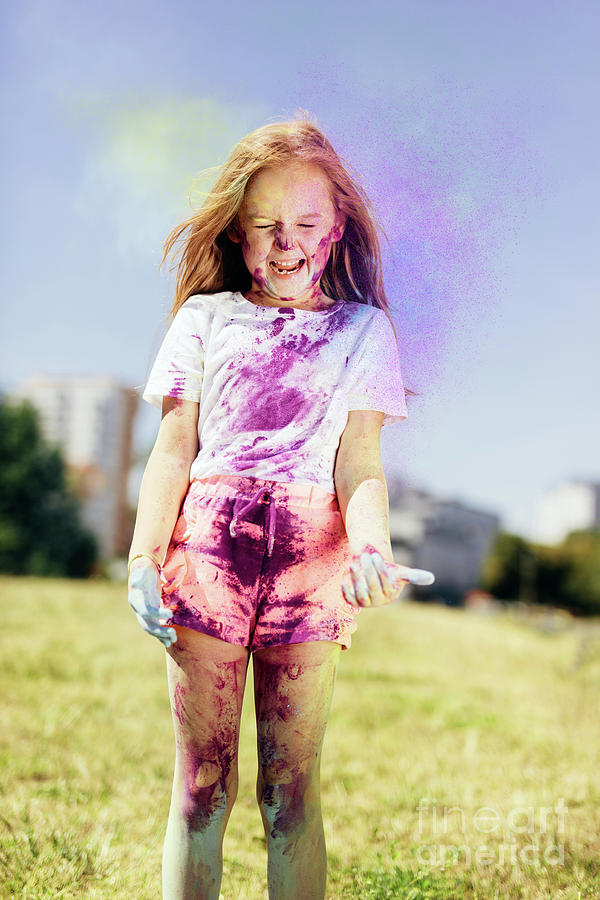 Little girl playing with holi powder outdoors Photograph by Michal Bednarek