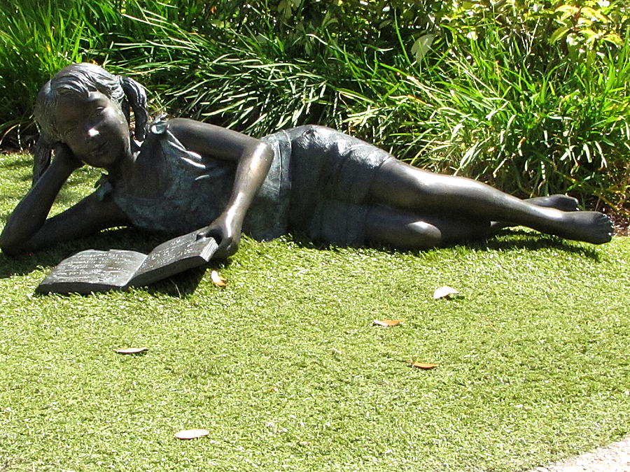 Little Girl Reading in the park statue  Photograph by Christopher Mercer
