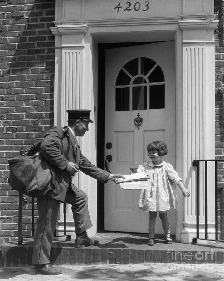 Little Girl Taking Mail From Postman Photograph by H. Armstrong Roberts/ClassicStock