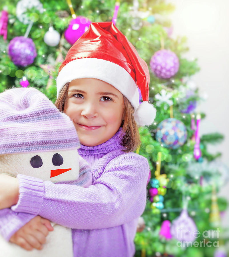 Little girl with snowman toy Photograph by Anna Om