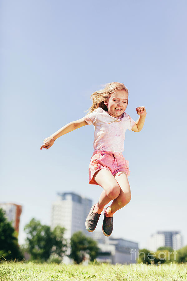 Little Happy Girl Jumping High On The Meadow Photograph By Michal