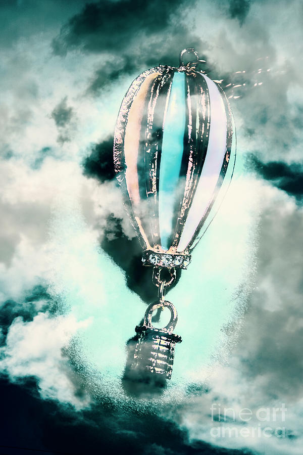 Little hot air balloon pendant and clouds Photograph by Jorgo Photography