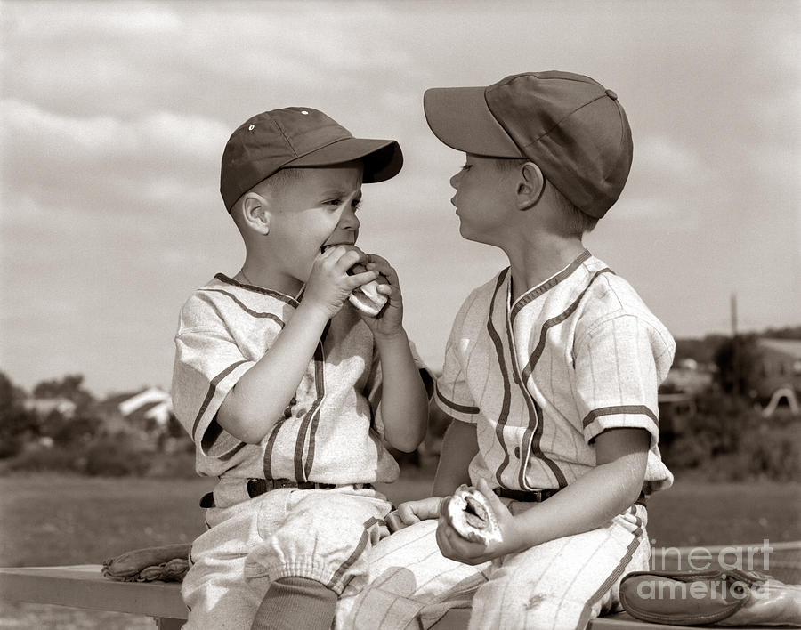 Little Leaguers Eating Hot Dogs, C.1960s Photograph by H. Armstrong Roberts/ClassicStock