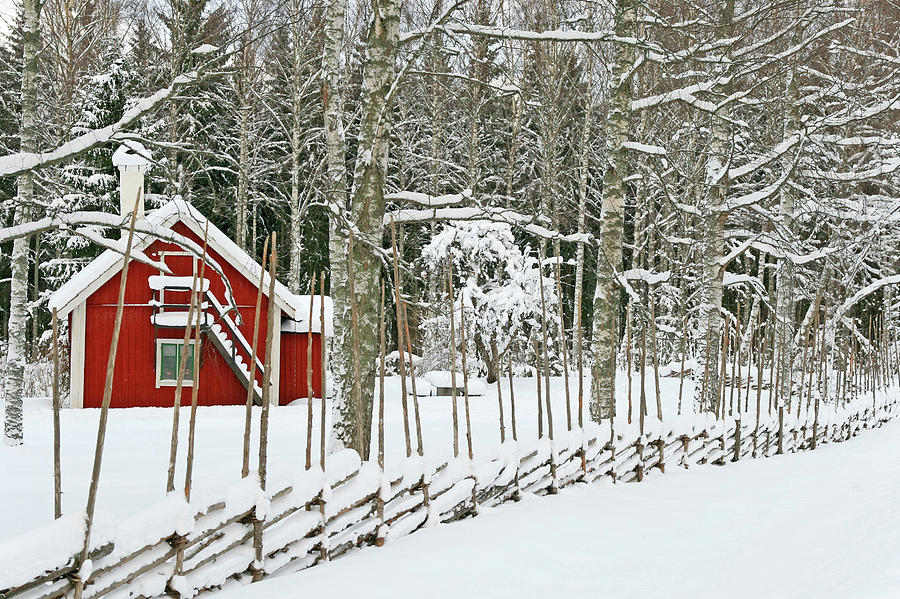 Winter Photograph - Little red house covered by snow by GoodMood Art