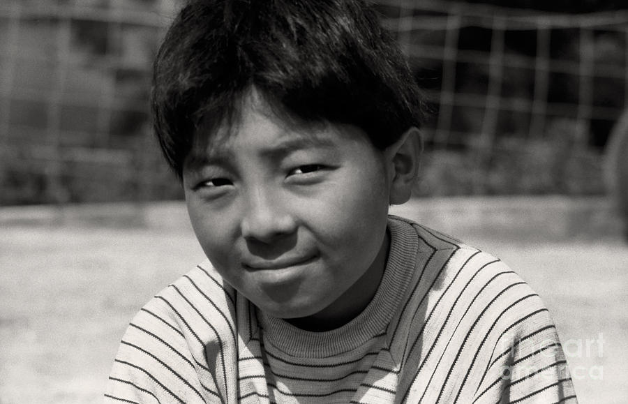 Little Tai boy Photograph by Morris Keyonzo