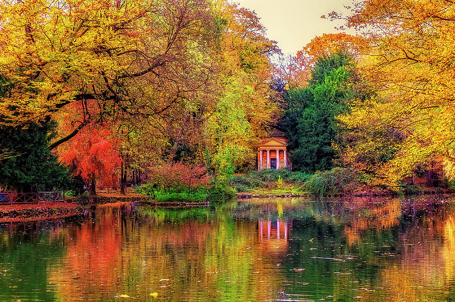 Little temple among fall colors Photograph by Roberto Pagani