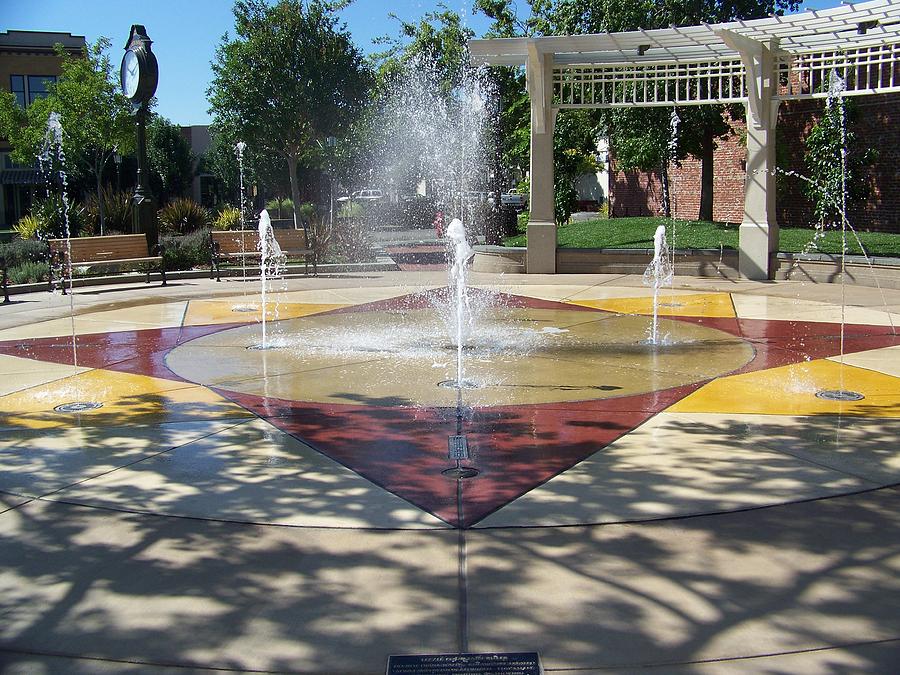 Family Fun Photograph - Lizzie Park Fountain by Maggie Cruser