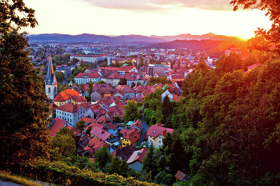 Ljubljana aerial rooftops view at red sunset Photograph by Brch Photography