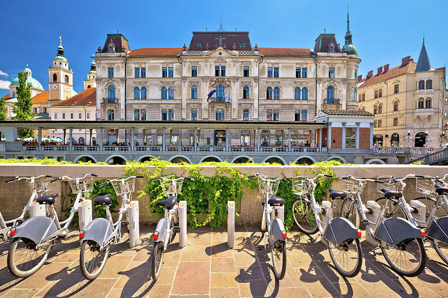 Ljubljana architecture and tourist bikes Photograph by Brch Photography