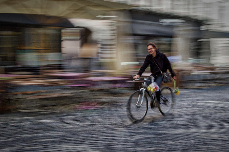 Ljubljana Bicycle Rider - Slovenia Photograph by Stuart Litoff
