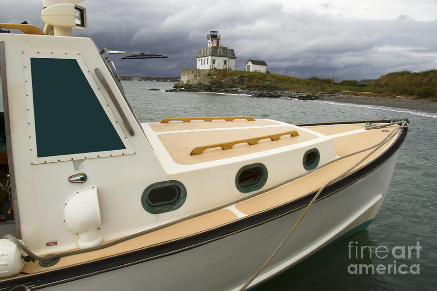 Lobster Boat and Lighthouse Photograph by Karen Foley