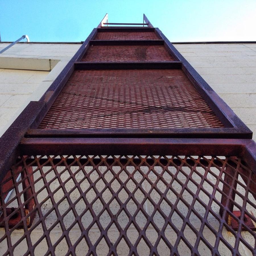 Architecture Photograph - Locked Ladder by Aubrey Erickson