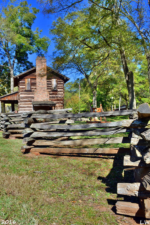Log Cabin And Wooden Fence At Ninety Six National Historic Site Photograph by Lisa Wooten