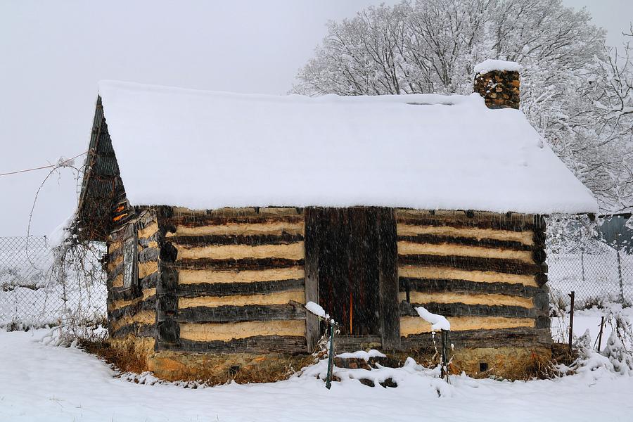 Winter Photograph - Log Cabin in the Snow by Kathryn Meyer
