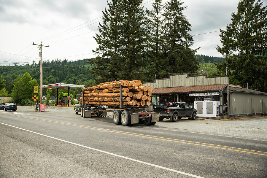 Logging Truck Pulling Off For Gas Photograph by Tom Cochran