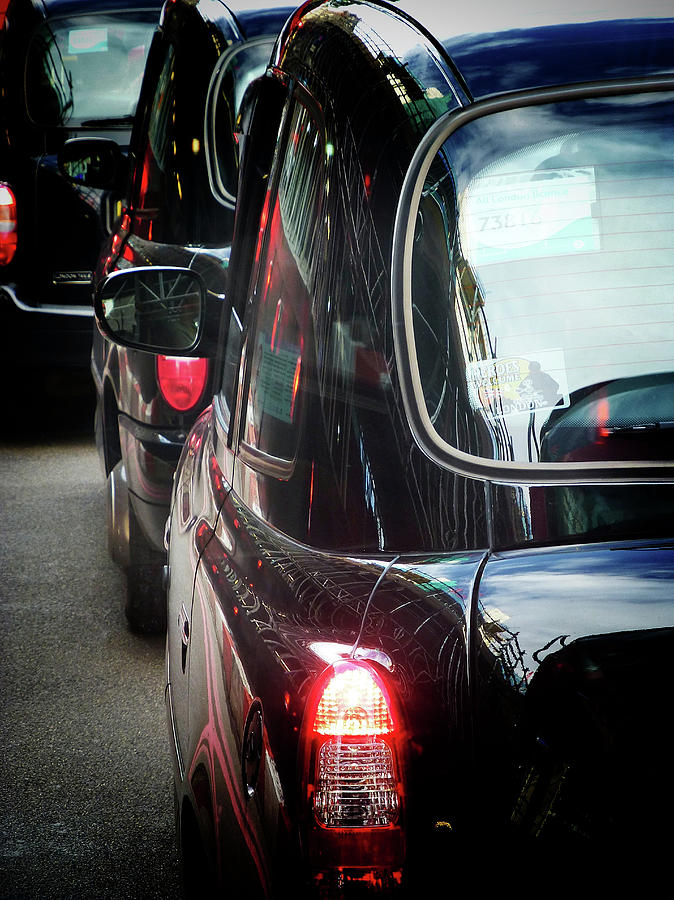 London Taxis  Photograph by Connie Handscomb