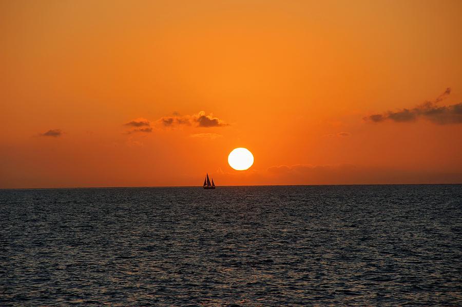 Sunset Photograph - Lone Boat by Matthew Hume