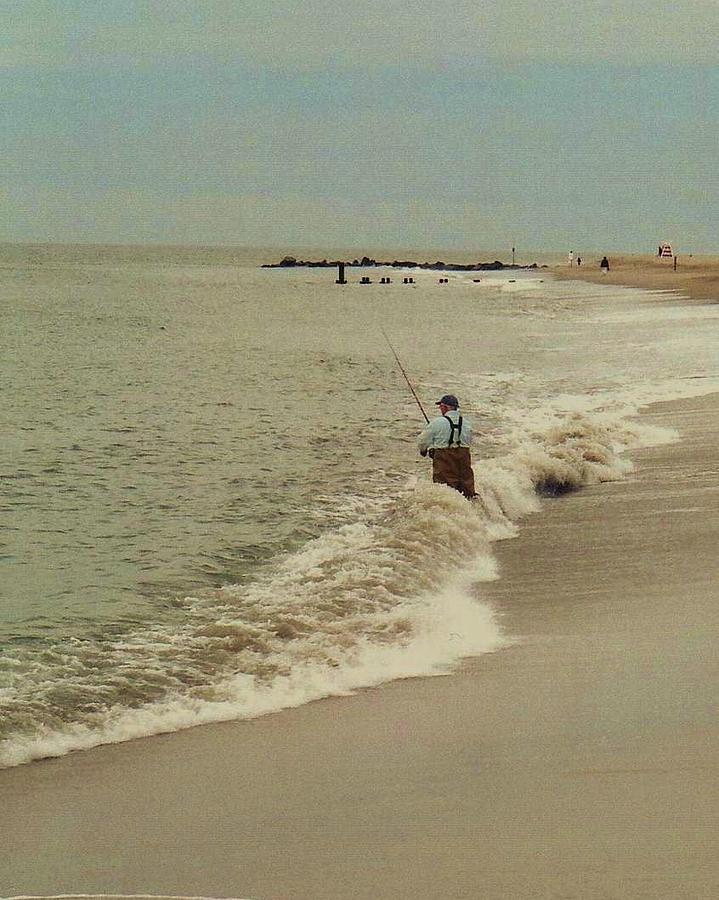 Lone fisherman Photograph by John Scates