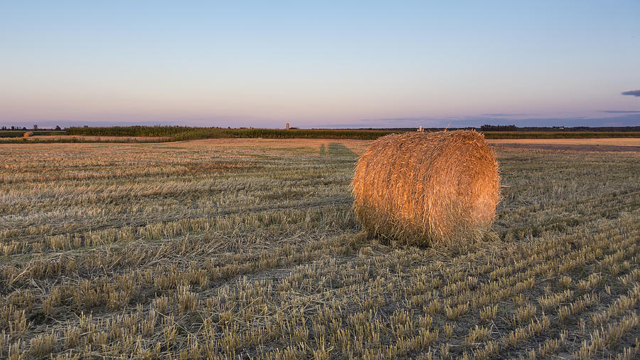 Lone hay bale Photograph by Josef Pittner