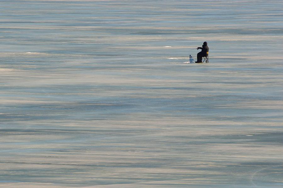 Lone Ice Fisherman  Photograph by Lyle Crump