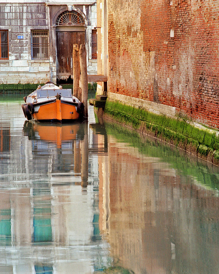 Boat Photograph - Lone Orange Boat in Venice by Greg Matchick