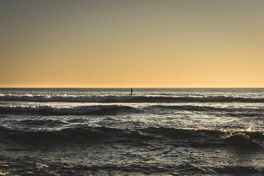 Lone Paddler At Sunset Photograph by Marco Oliveira