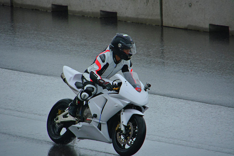 Lone Racer in the Rain Photograph by Mike Martin