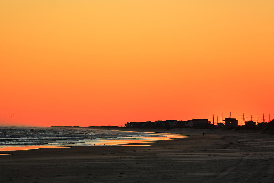 Lone runner at sunset Photograph by Joni Eskridge