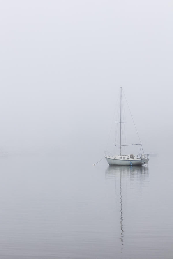 Lonely Boat in the fog  Photograph by John McGraw