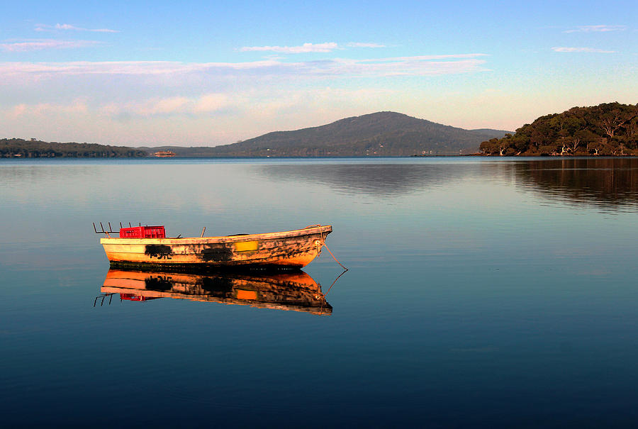 Lonely Boat On The Lake Photograph by Kim Wainwright