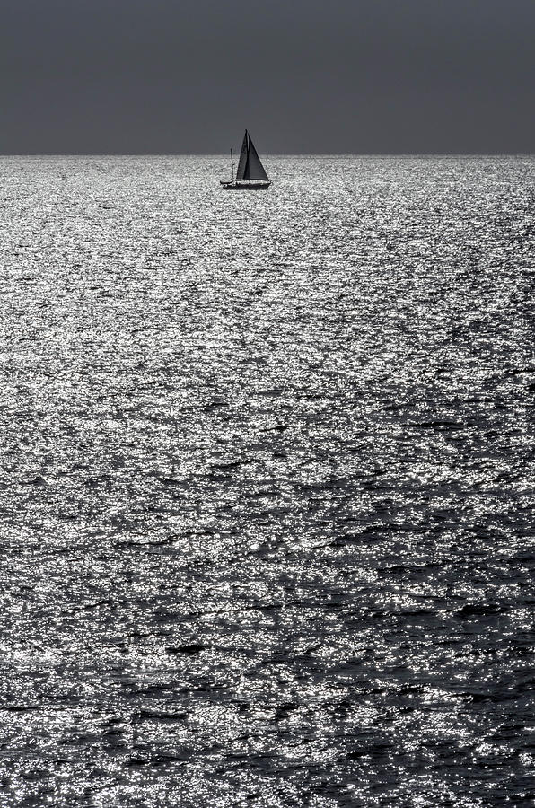 Lonely Sailing Into The Night Photograph by Wolfgang Stocker