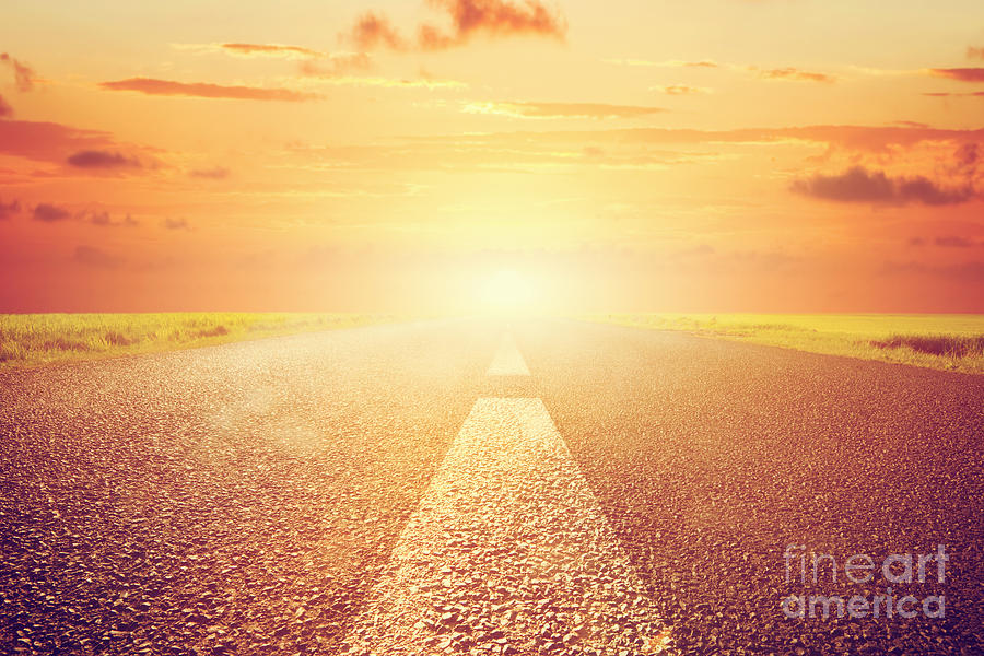 Transportation Photograph - Long empty asphalt road towards sunset sun by Michal Bednarek