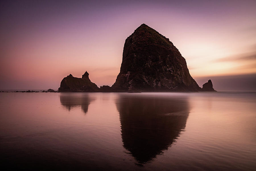 Long exposure of Haystack Rock at Sunset Photograph by Pierre Leclerc Photography