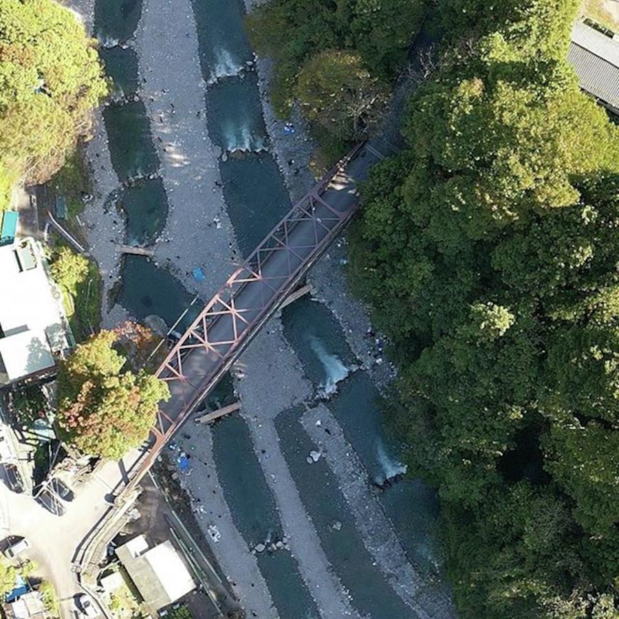 Cloudnine Photograph - Look Down Bridge And Riverside by T Hirano 